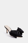 Loeffler Randall black pointed toe mule with a stiletto kitten heel, accented by large fabric bows on the upper front for an elegant finish.