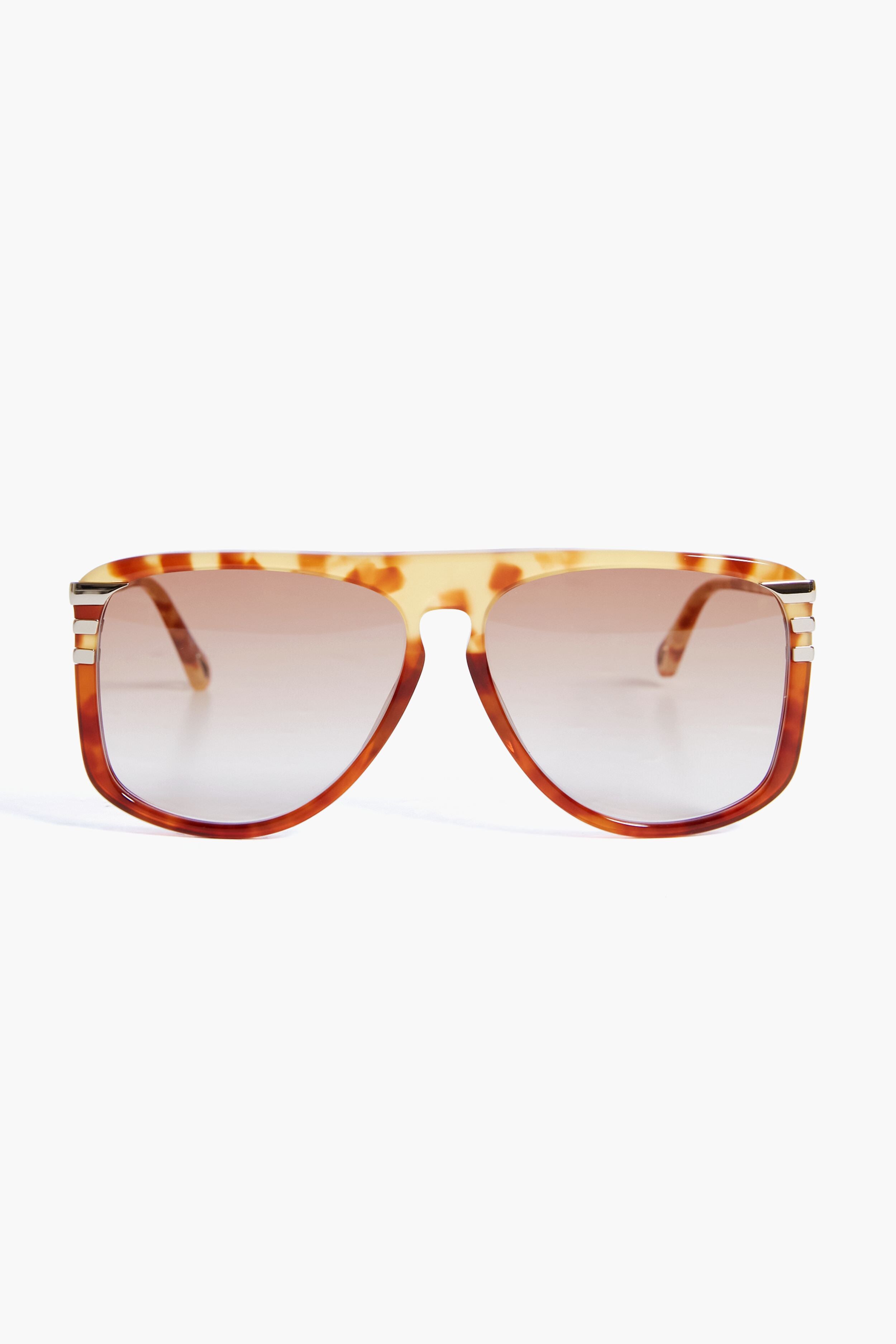 Chloe aviator sunglasses featuring brown tortoiseshell gradient frames and metallic temple accents.