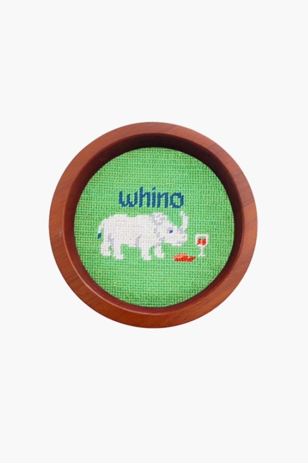 This round, hand-stitched needlepoint by Smathers and Branson features a white rhinoceros beside a glass of red wine with "whino" above, making it a unique wine gift or wine bottle coaster in a wooden frame.