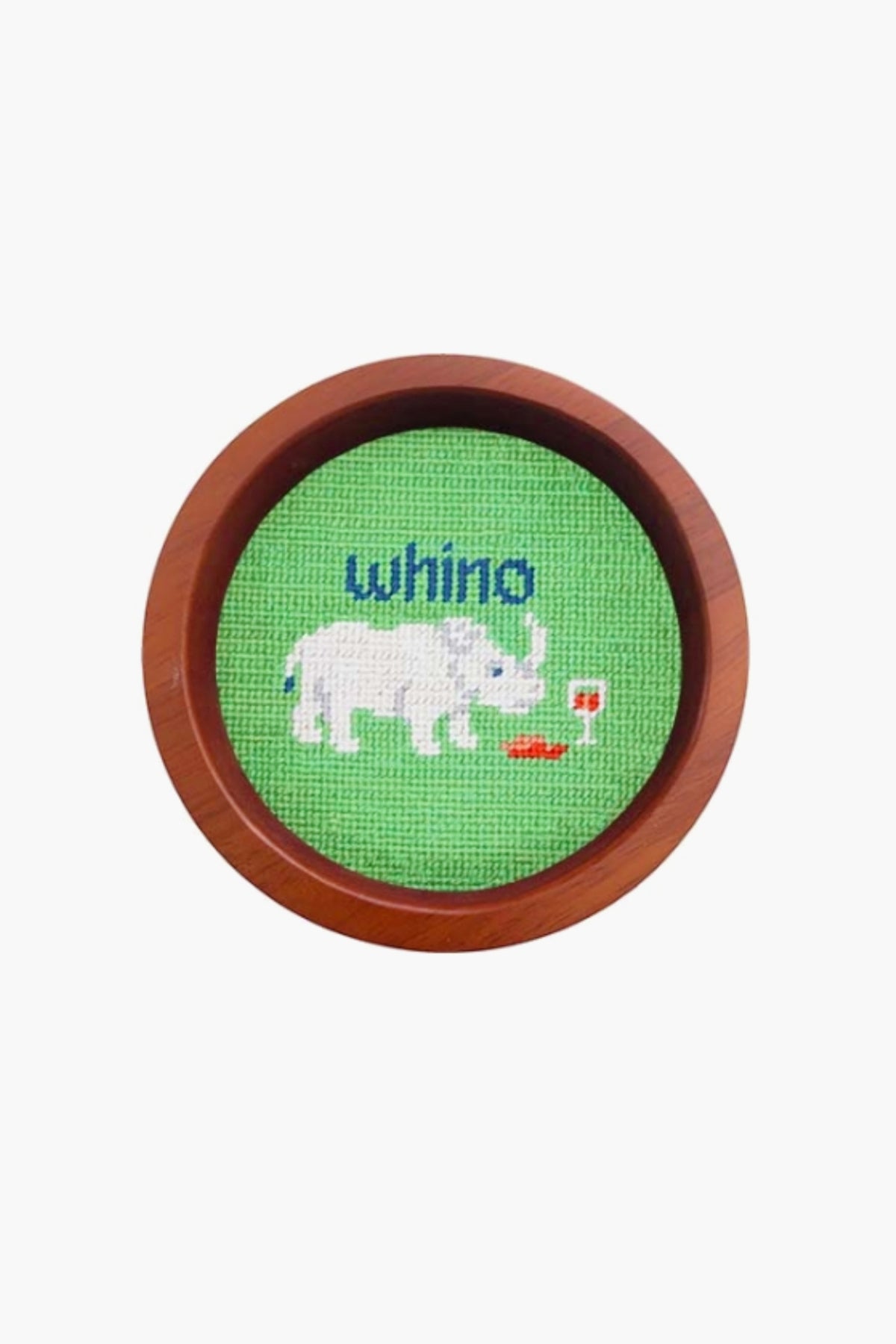 This round, hand-stitched needlepoint by Smathers and Branson features a white rhinoceros beside a glass of red wine with "whino" above, making it a unique wine gift or wine bottle coaster in a wooden frame.