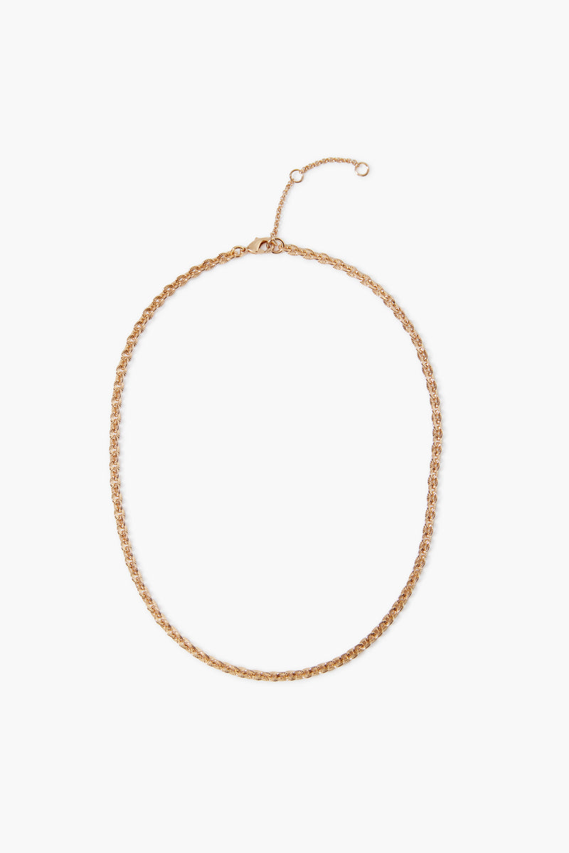 The Tuckernuck Jewelry gold cable link necklace features a textured design and adjustable clasp, making it perfect for lovers of dainty jewelry.