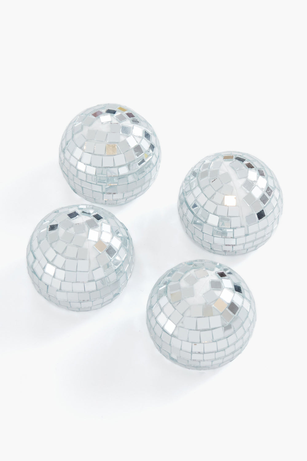 Chefanie’s set of four small, dome-shaped placecard holders, covered in silver mirror tiles like mini disco balls, add a fun and festive touch to your next dinner party decor.