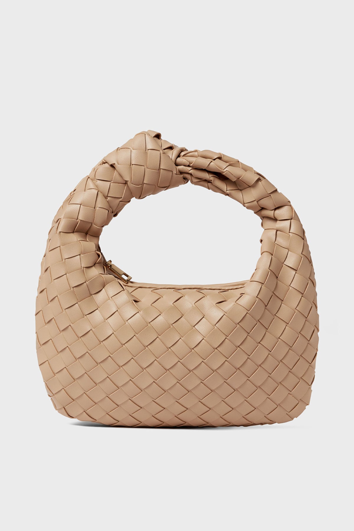 Urban Expressions beige woven vegan leather handbag features a curved top handle and knotted detail, offering a chic, animal-friendly design.