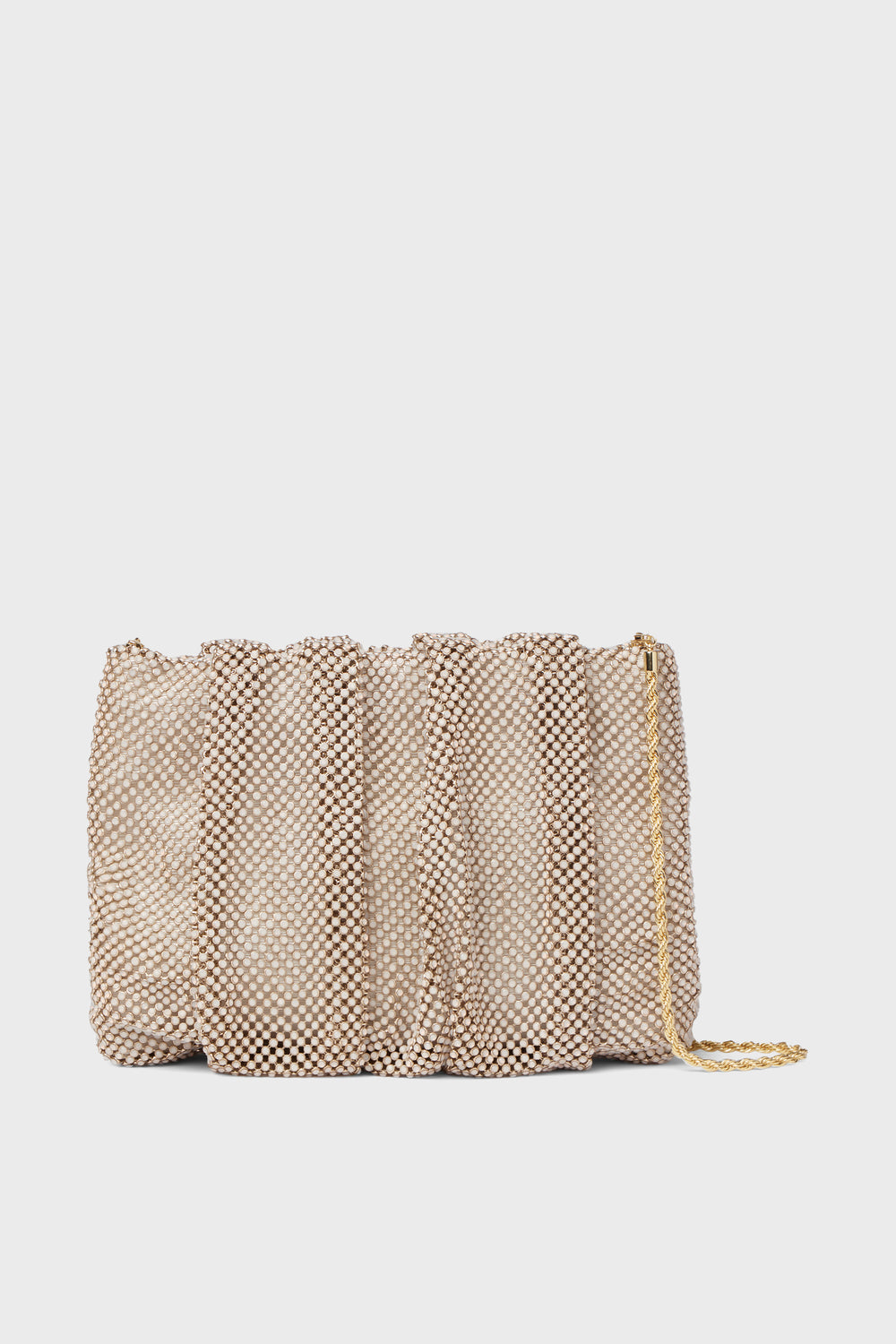 A beige mesh evening bag with a ruched texture and gold chain strap from Loeffler Randall, inspired by their Opal Diamante Clutch.