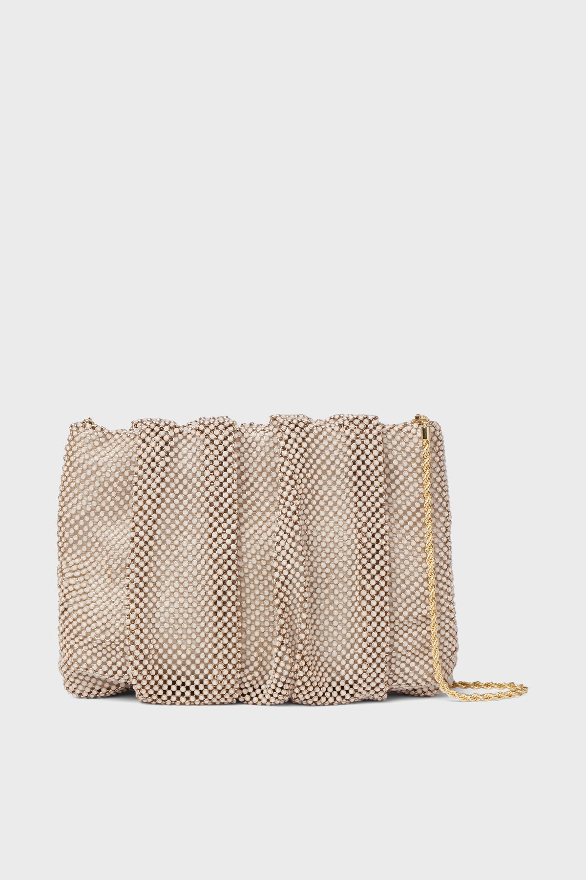 A beige mesh evening bag with a ruched texture and gold chain strap from Loeffler Randall, inspired by their Opal Diamante Clutch.