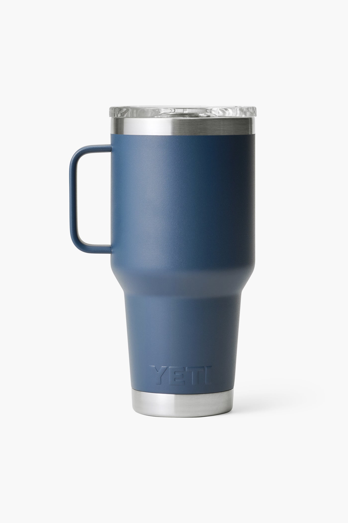 The YETI Rambler Tumbler is a navy blue travel mug with a handle, stainless steel rim and base, and double-wall vacuum insulation.