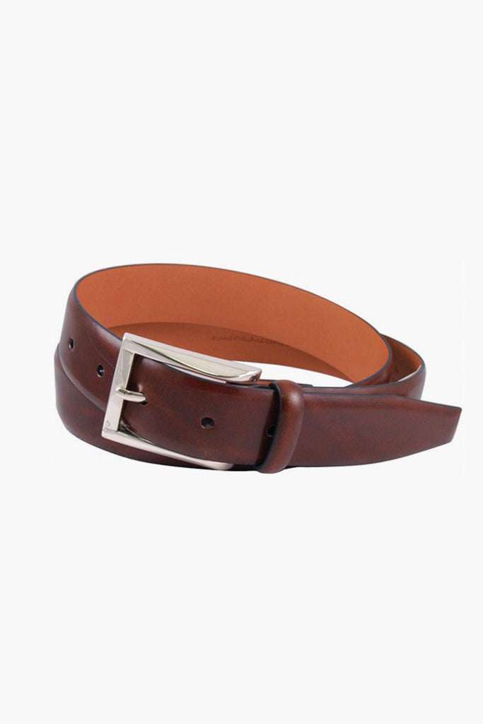 The Trafalgar brown leather belt features a silver rectangular buckle and is crafted from premium cortina leather, exemplifying luxury men's accessories.