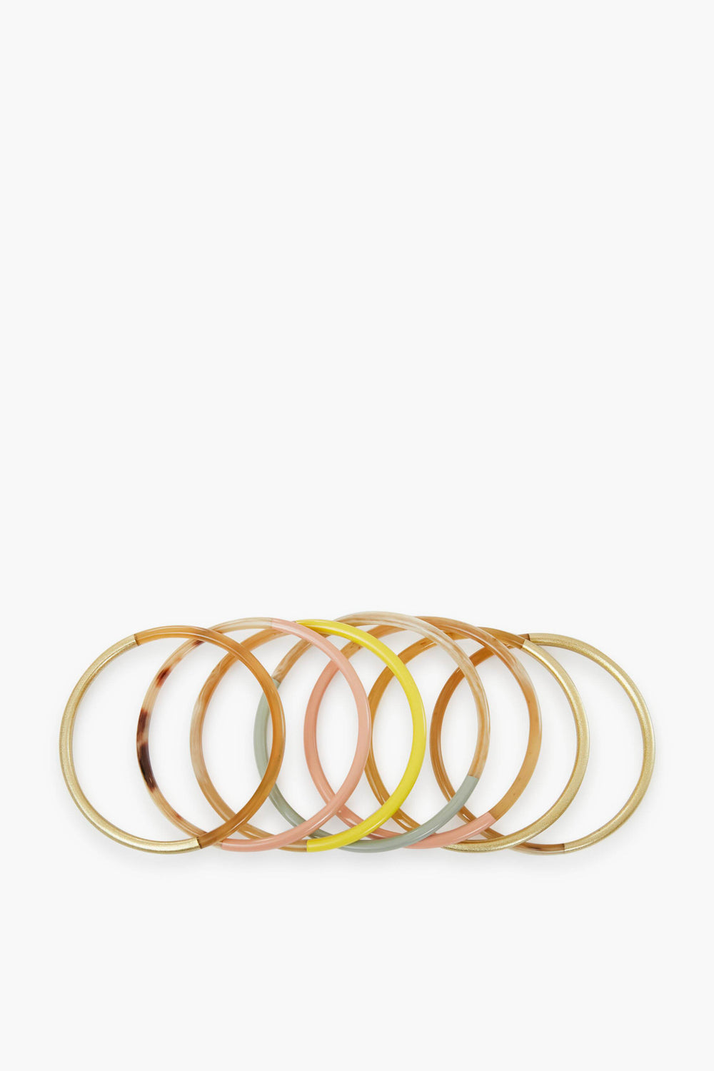 Six colorful bangles with gold accents, part of the Exclusive Sunset Bangle Stack by Sunshine Tienda x Ashley Brooke—artisan-crafted from cruelty-free buffalo horn.