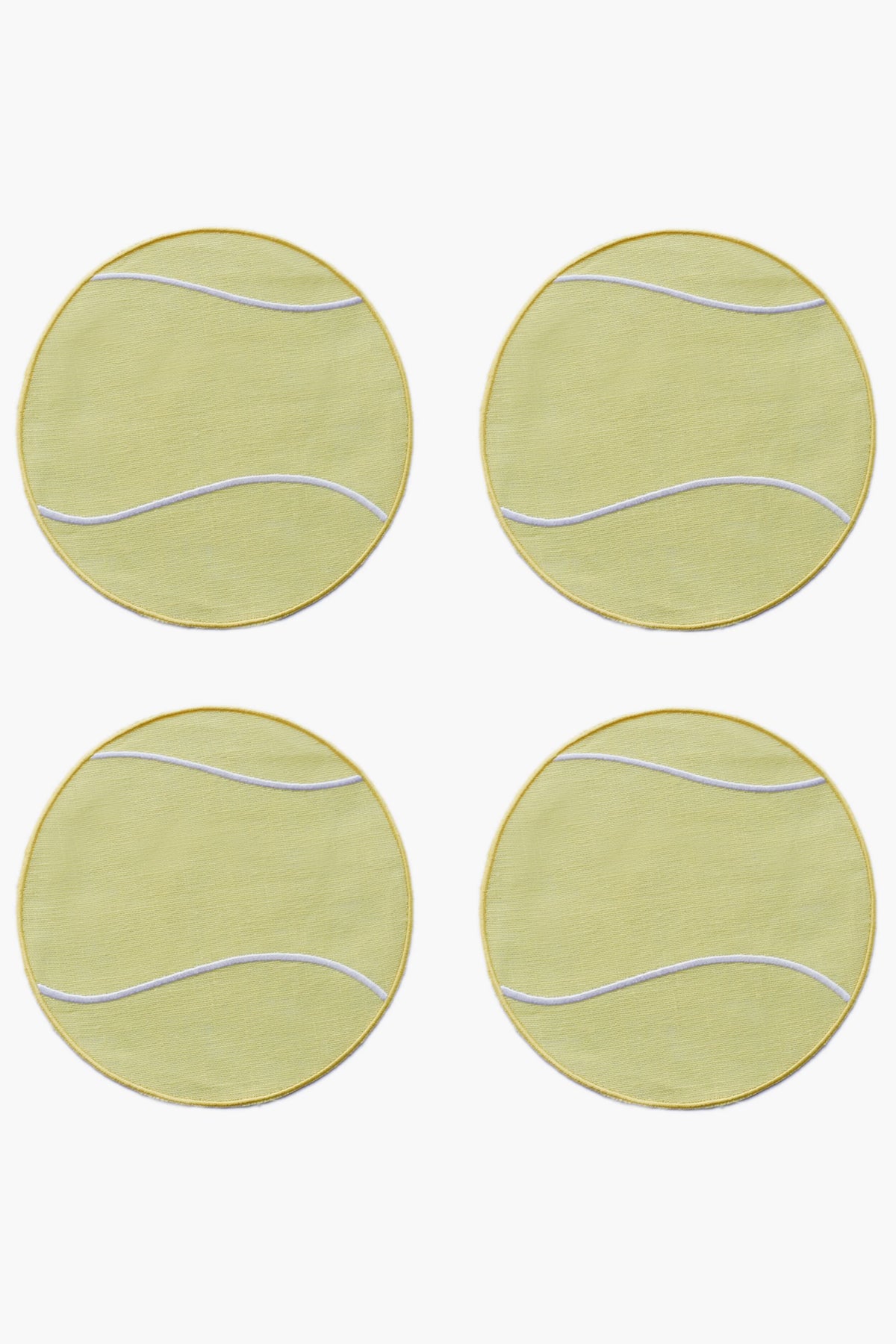 Four round yellow coasters with white curved lines, arranged in a square grid—resembling Tennis Ball Cocktail Napkins by Chefanie, perfect as a racket sport gift.