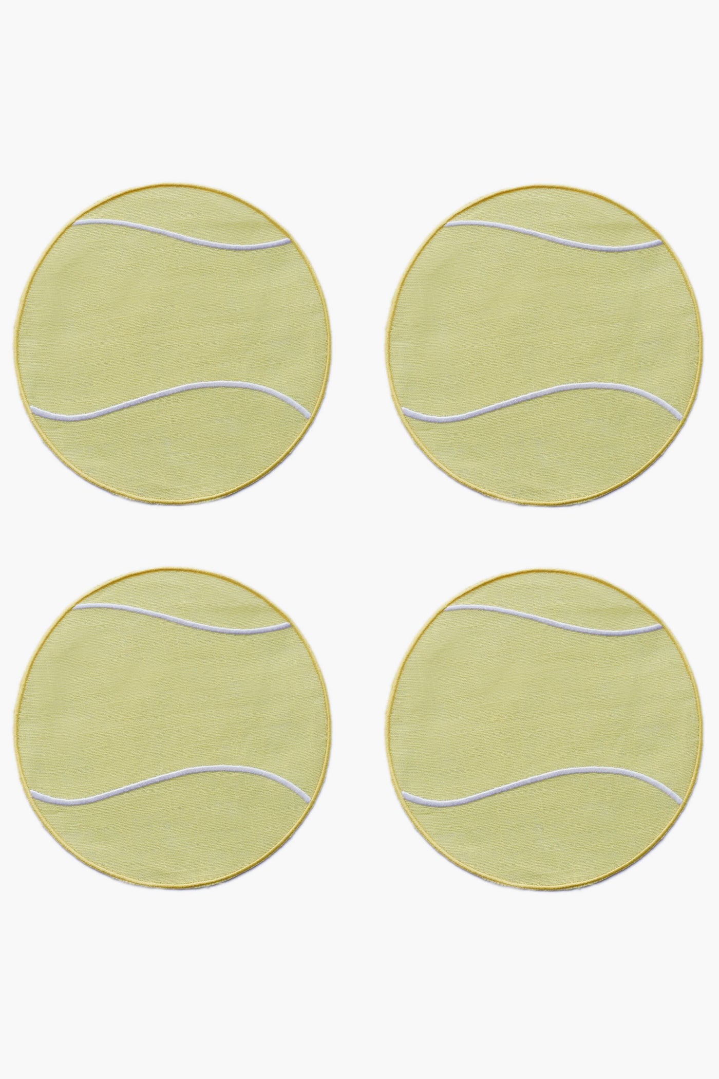 Four round yellow coasters with white curved lines, arranged in a square grid—resembling Tennis Ball Cocktail Napkins by Chefanie, perfect as a racket sport gift.