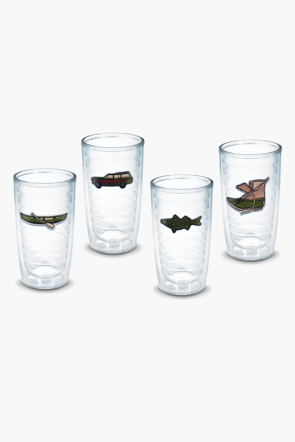 Four clear Tervis Tumbler x Tuckernuck tumblers, each featuring a unique embroidered patch—a canoe, car, fish, and boot—are arranged in a row. Their BPA-free double-wall design keeps drinks at the perfect temperature.
