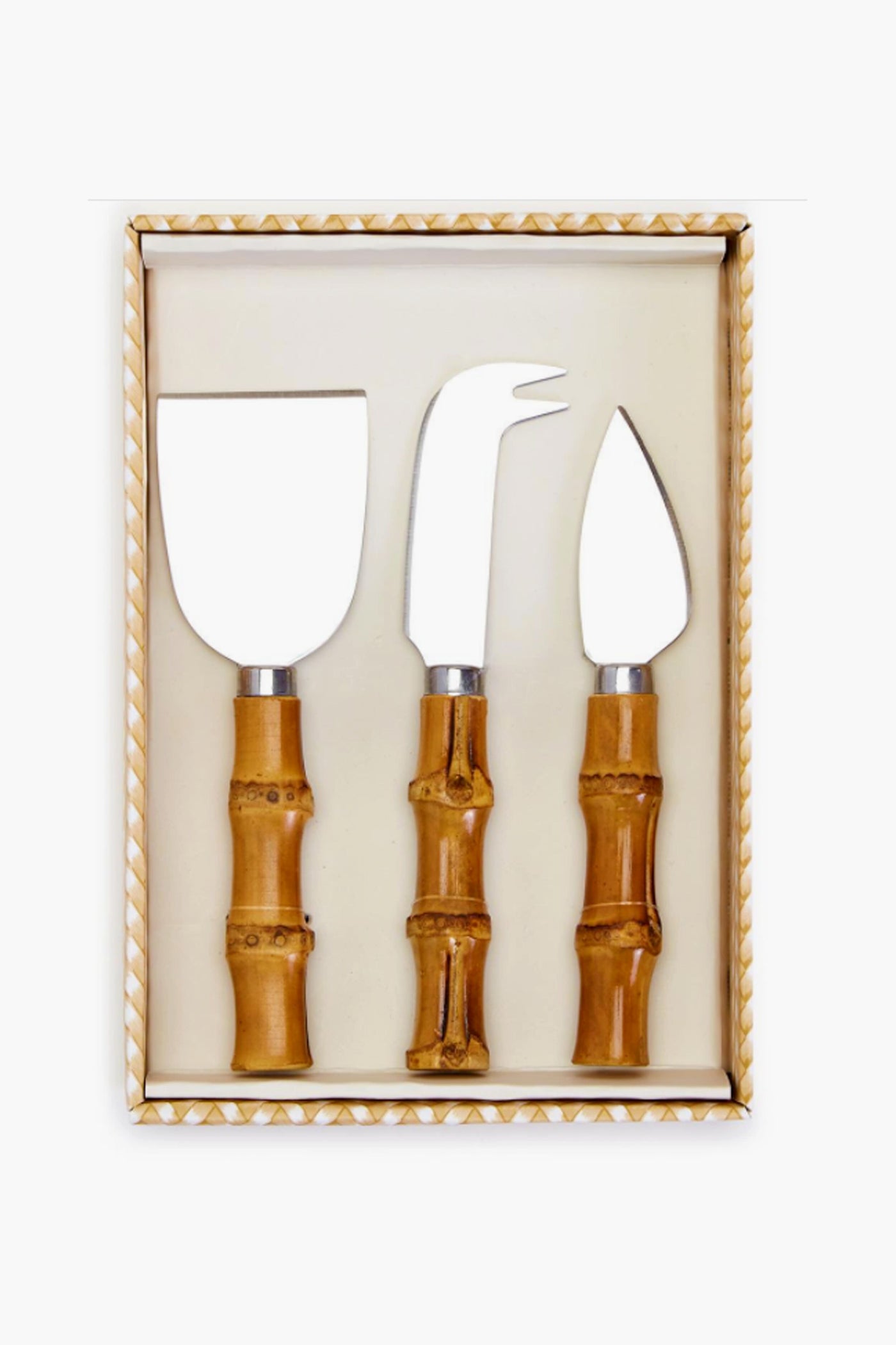 The Two's Company cheese knife set features stainless steel blades and bamboo-style handles in a sleek rectangular box—ideal charcuterie accessories for any gathering.