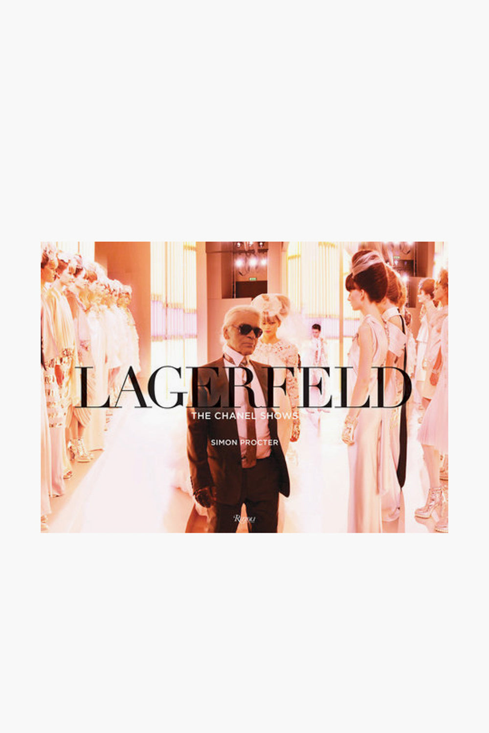 Cover of the Rizzoli fashion book "Lagerfeld: The Chanel Shows" featuring Karl Lagerfeld among models in a brightly lit room during iconic Chanel runway shows.