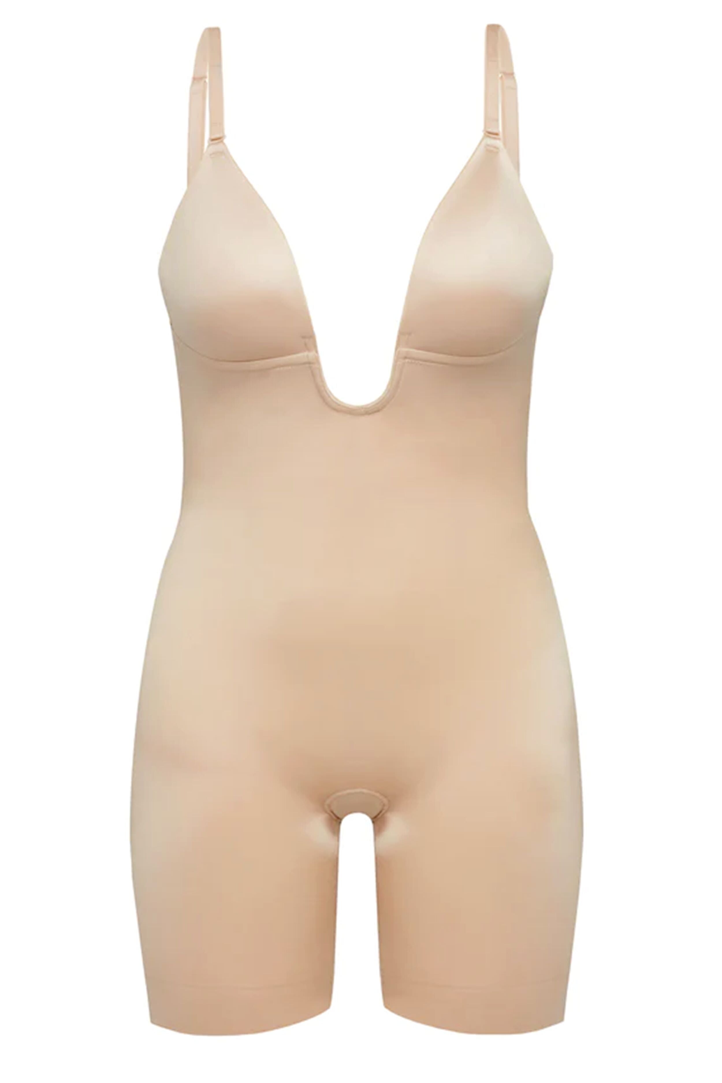 The SPANX beige shaping bodysuit features a deep V-neck, convertible straps, and mid-thigh length legs.