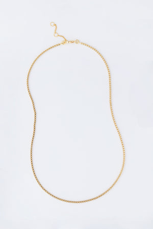 The Tuckernuck Jewelry gold box chain necklace features a small clasp and adjustable links, making it a chic and versatile addition to your jewelry collection.