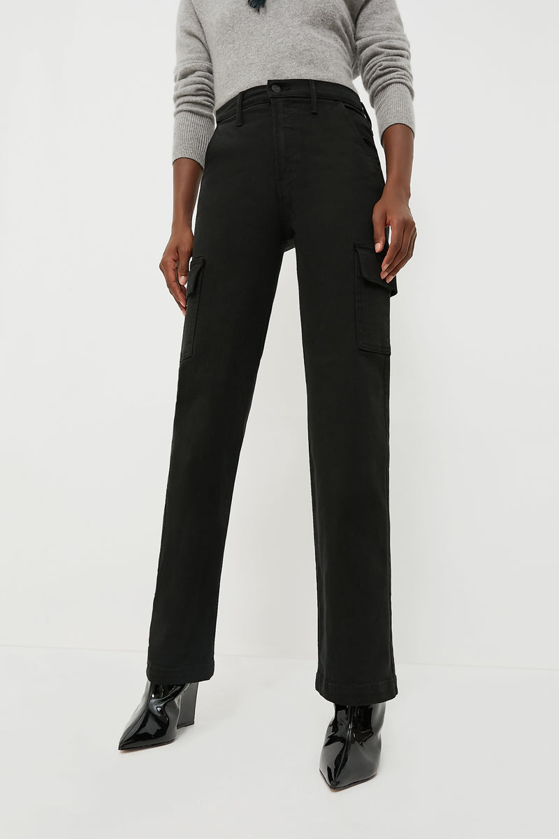 Someone wears a grey sweater, MOTHER high rise wide leg cargo jeans in soft stretch denim with side pockets, and black pointed-toe ankle boots.