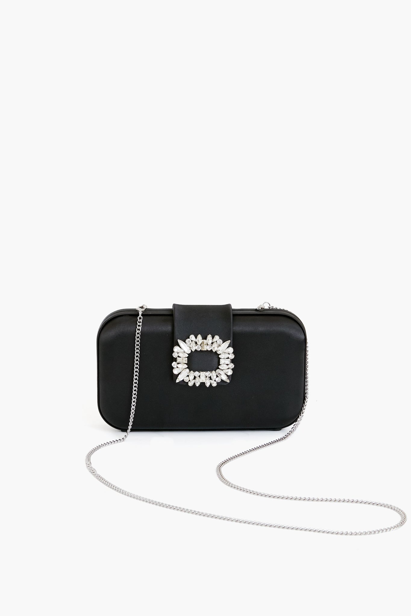 The Olga Berg rectangular black crystal clutch features a silver jeweled buckle and a long silver chain strap, making it perfect for evening collections.