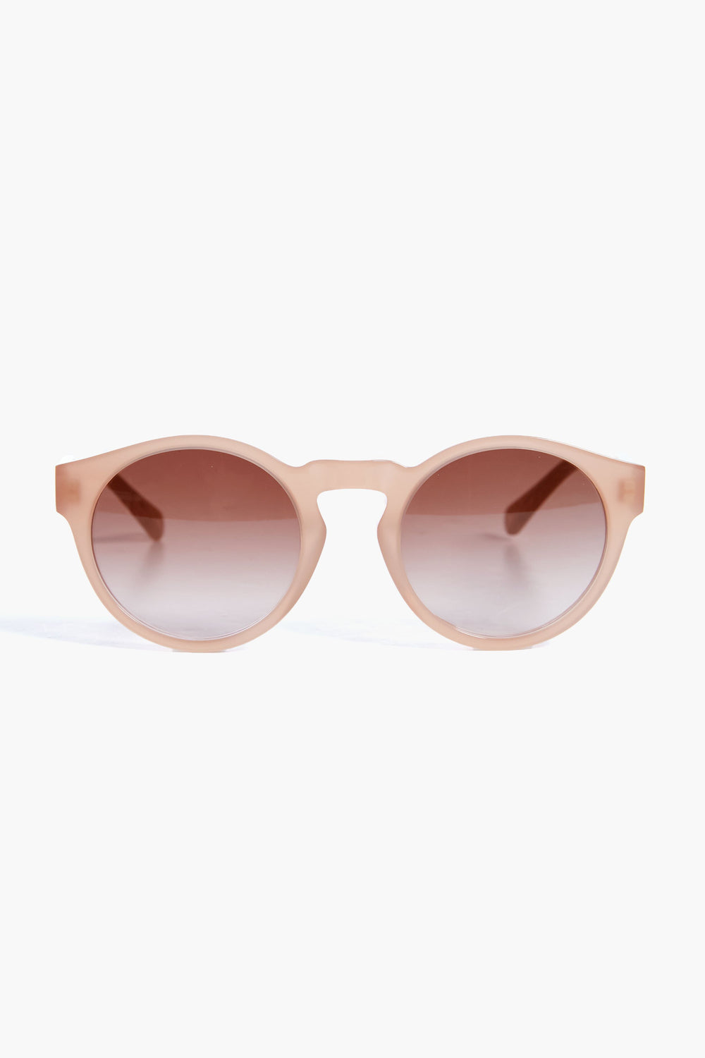 Chloe beige round-frame sunglasses with brown gradient lenses are elegantly displayed.