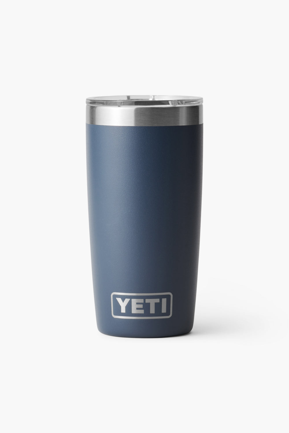 A navy blue YETI Rambler Tumbler with a stainless steel rim and clear lid, featuring the YETI logo. The vacuum-insulated cup keeps beverages at the ideal temperature.