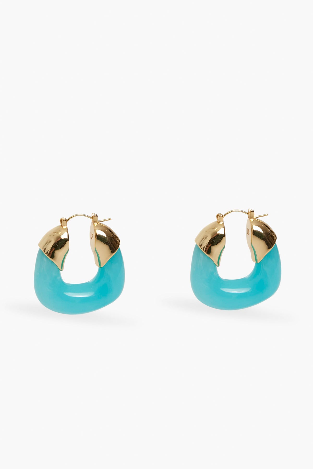 Lizzie Fortunato gold-plated hoop earrings with turquoise accents and a hinged clasp, displayed in a minimalist setting.