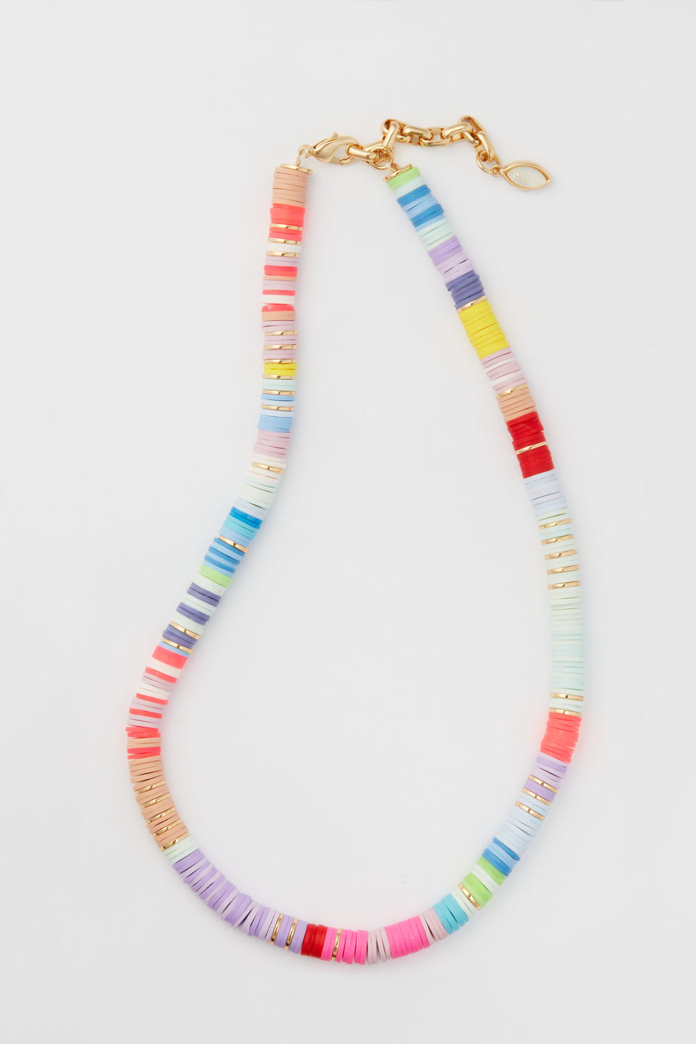 Mignonne Gavigan’s multicolor beaded necklace features flat, round beads and a gold-toned clasp—an eye-catching summer strand that’s ideal for layering with your favorite gold-plated jewelry.