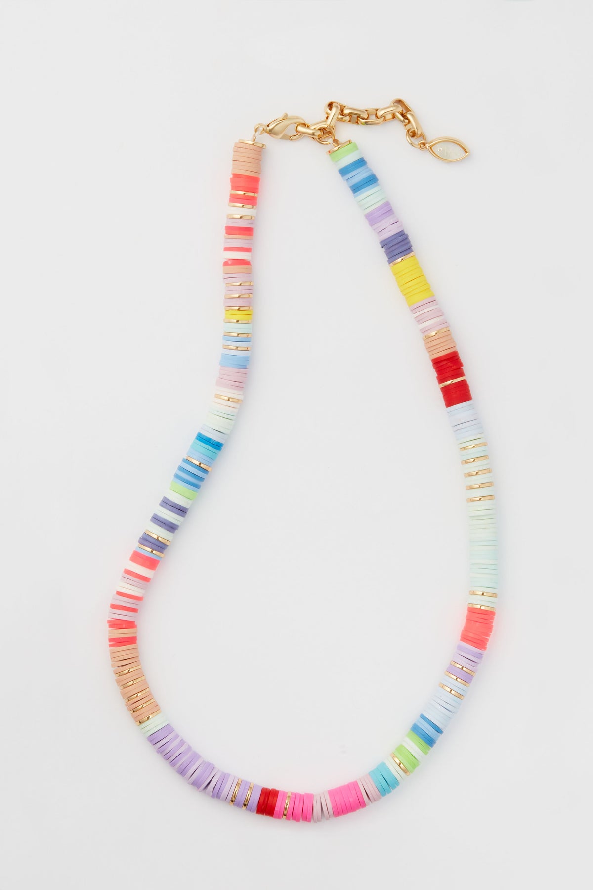 Mignonne Gavigan’s multicolor beaded necklace features flat, round beads and a gold-toned clasp—an eye-catching summer strand that’s ideal for layering with your favorite gold-plated jewelry.