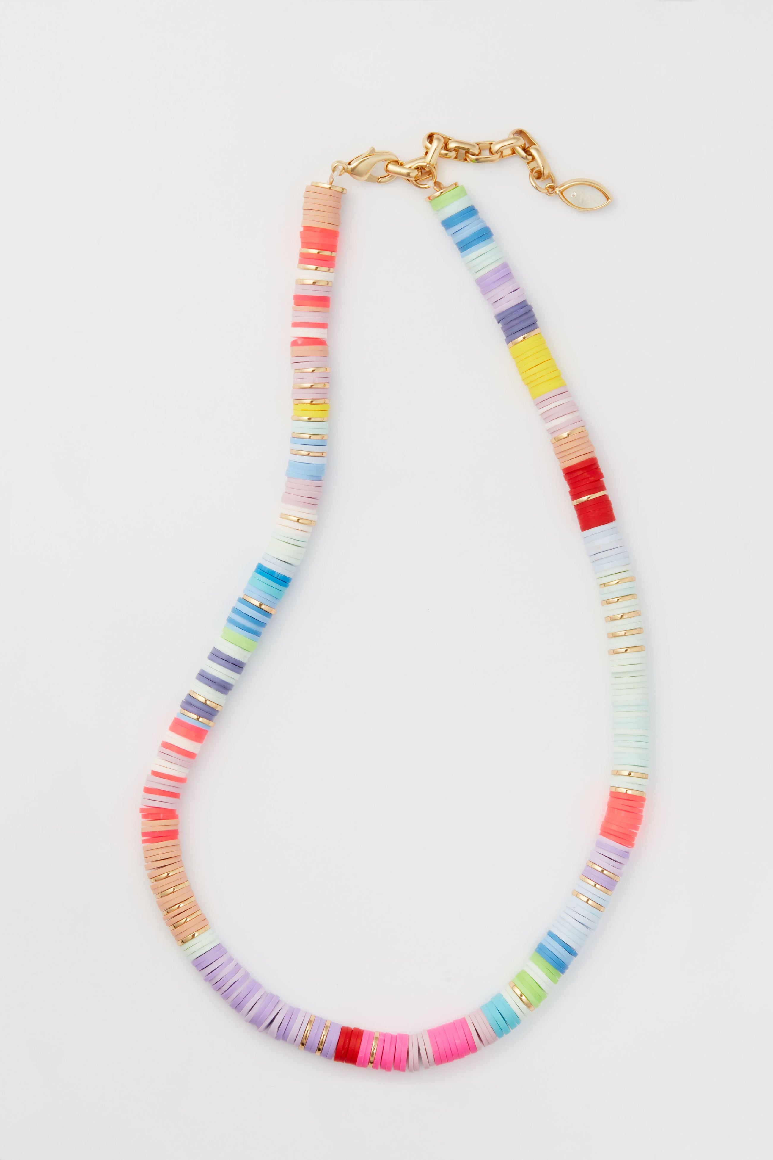 Mignonne Gavigan’s multicolor beaded necklace features flat, round beads and a gold-toned clasp—an eye-catching summer strand that’s ideal for layering with your favorite gold-plated jewelry.