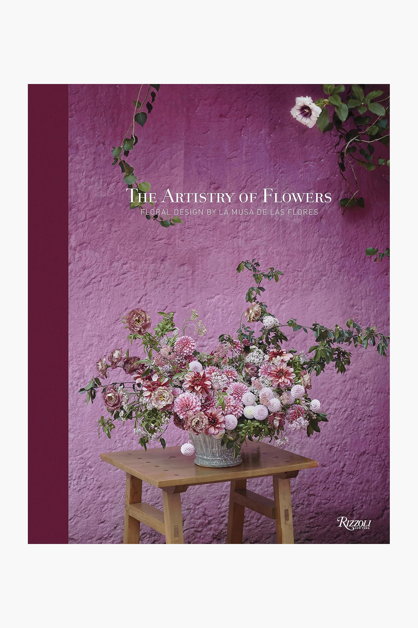 A floral design in a vase sits on a wooden stool, with the text "The Artistry of Flowers" and the brand name Rizzoli displayed at the top of the image.