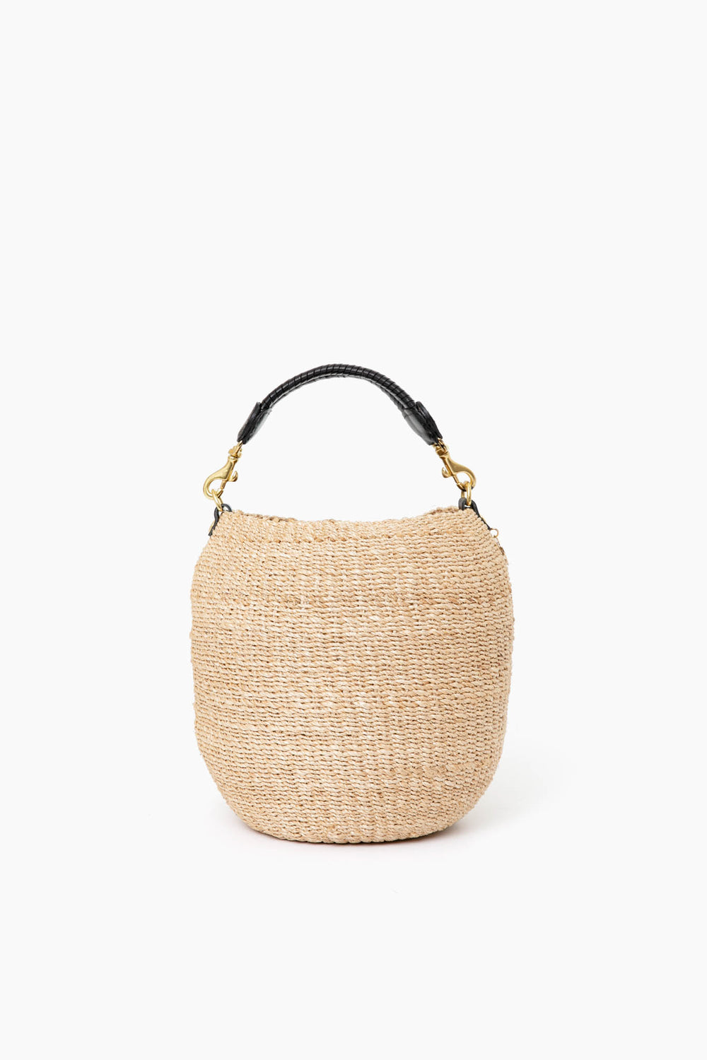 Clare V's round woven straw bag features a short black top handle and gold hardware, offering a stylish, modern look.