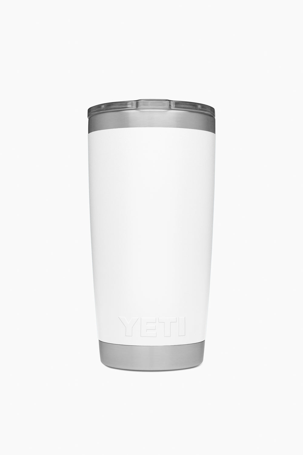 A YETI Rambler tumbler in white stainless steel stands upright, featuring a silver lid and base that showcase its vacuum insulated design.
