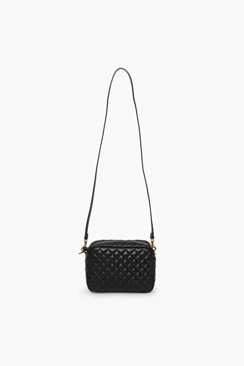 Clare V Midi Sac rectangular crossbody bag in black quilted leather features a long strap, making it perfect for everyday style.