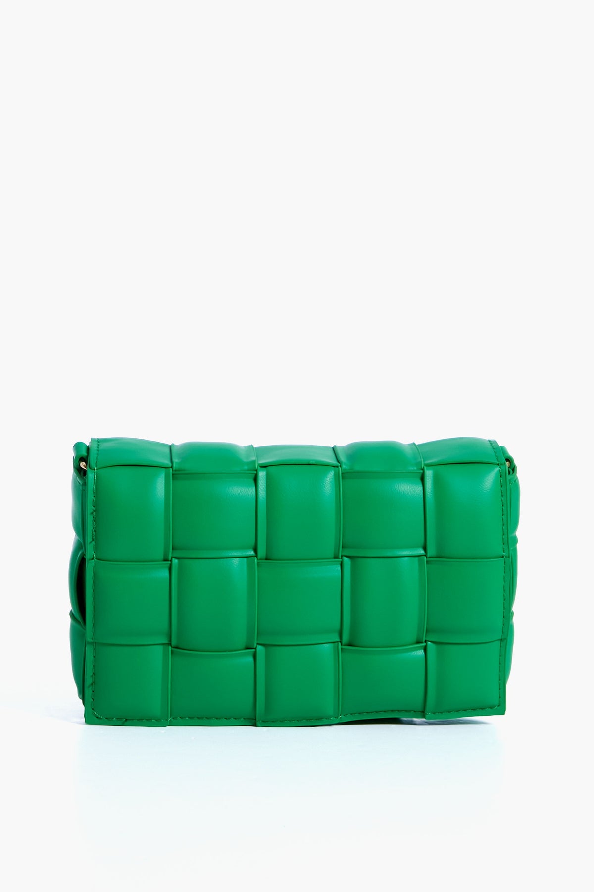 The Urban Expressions Kelly Green rectangular woven bag features a large, padded pattern, crafted from vegan leather and designed as an animal-friendly crossbody.