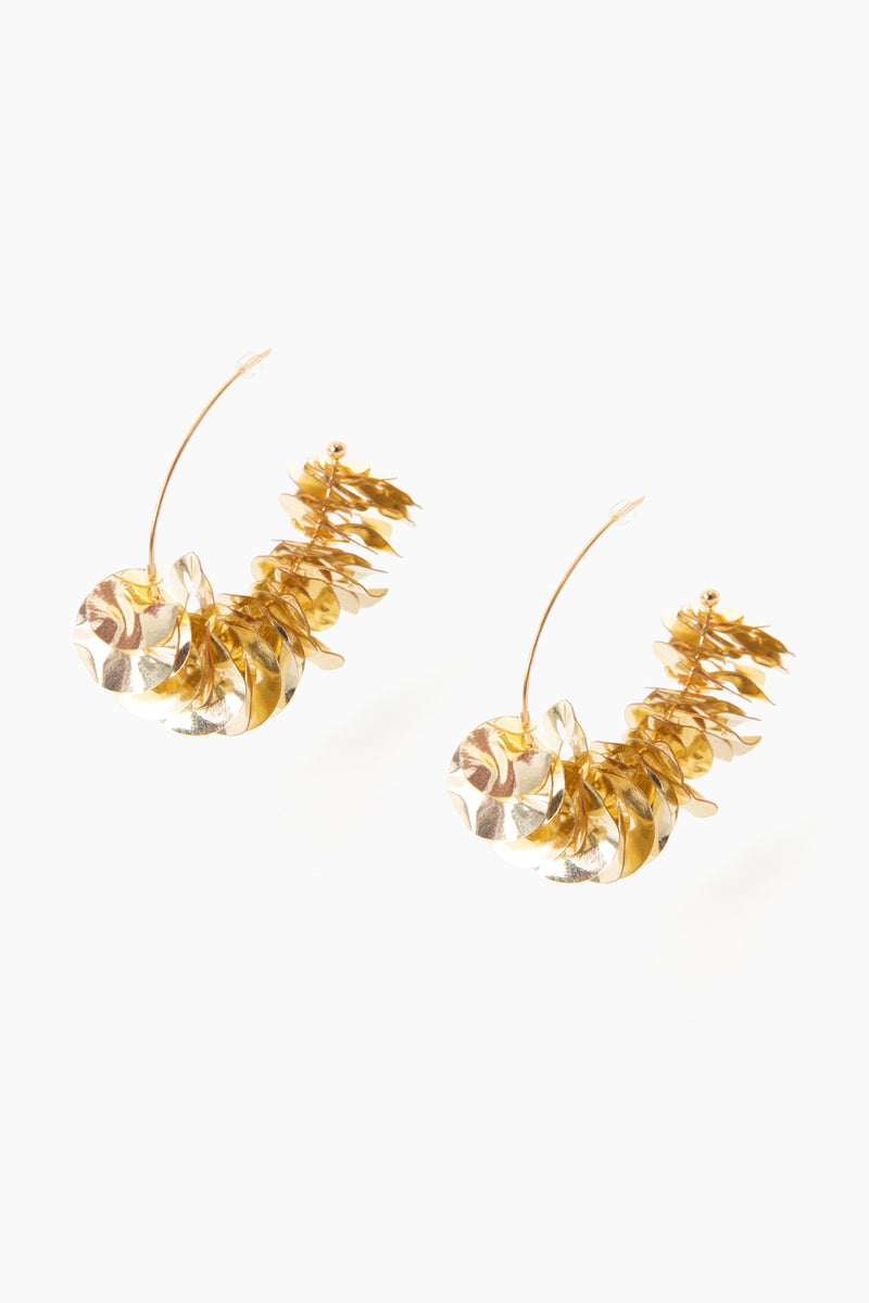 Elevate any look with Mignonne Gavigan's unique 18K gold-plated metallic earrings, featuring layered leaf-like shapes and curved hooks in a stunning gold and silver design.