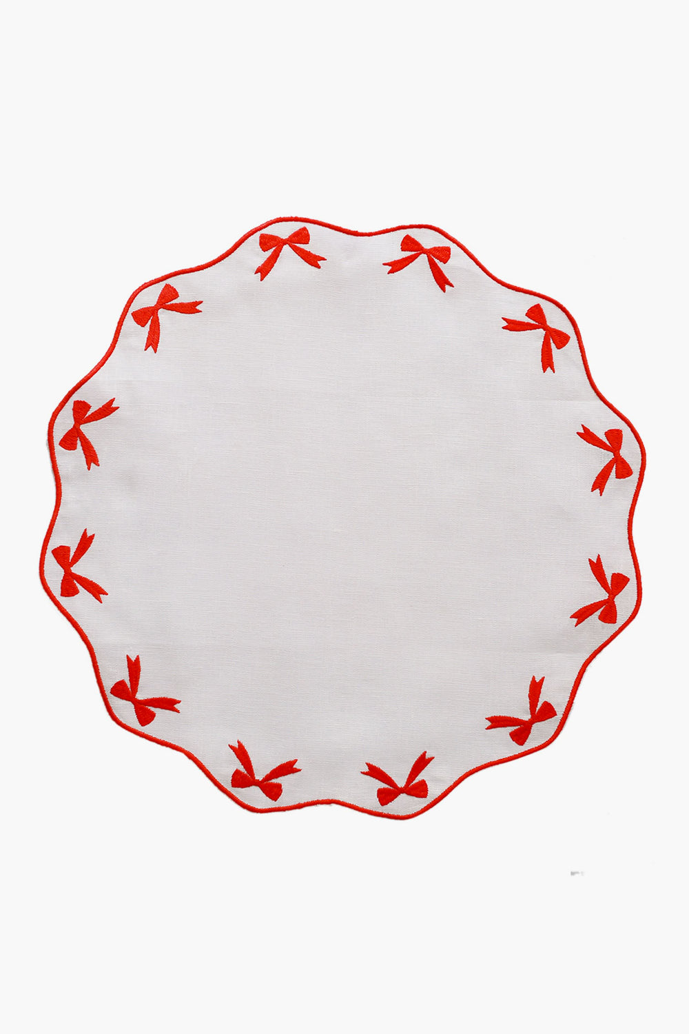Chefanie round white linen placemat with scalloped edge, red embroidered bows around the border—a charming hostess gift.