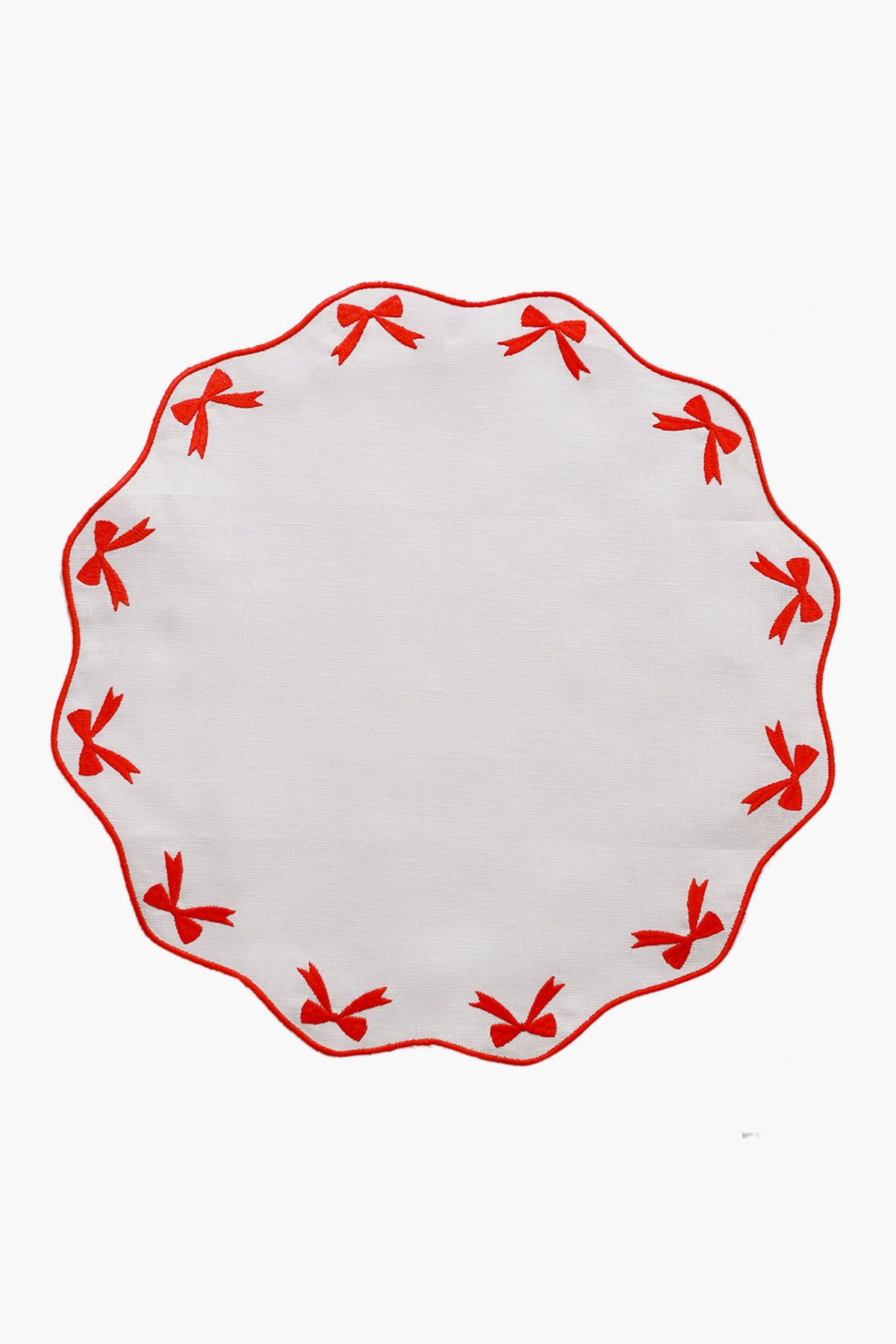 Chefanie round white linen placemat with scalloped edge, red embroidered bows around the border—a charming hostess gift.