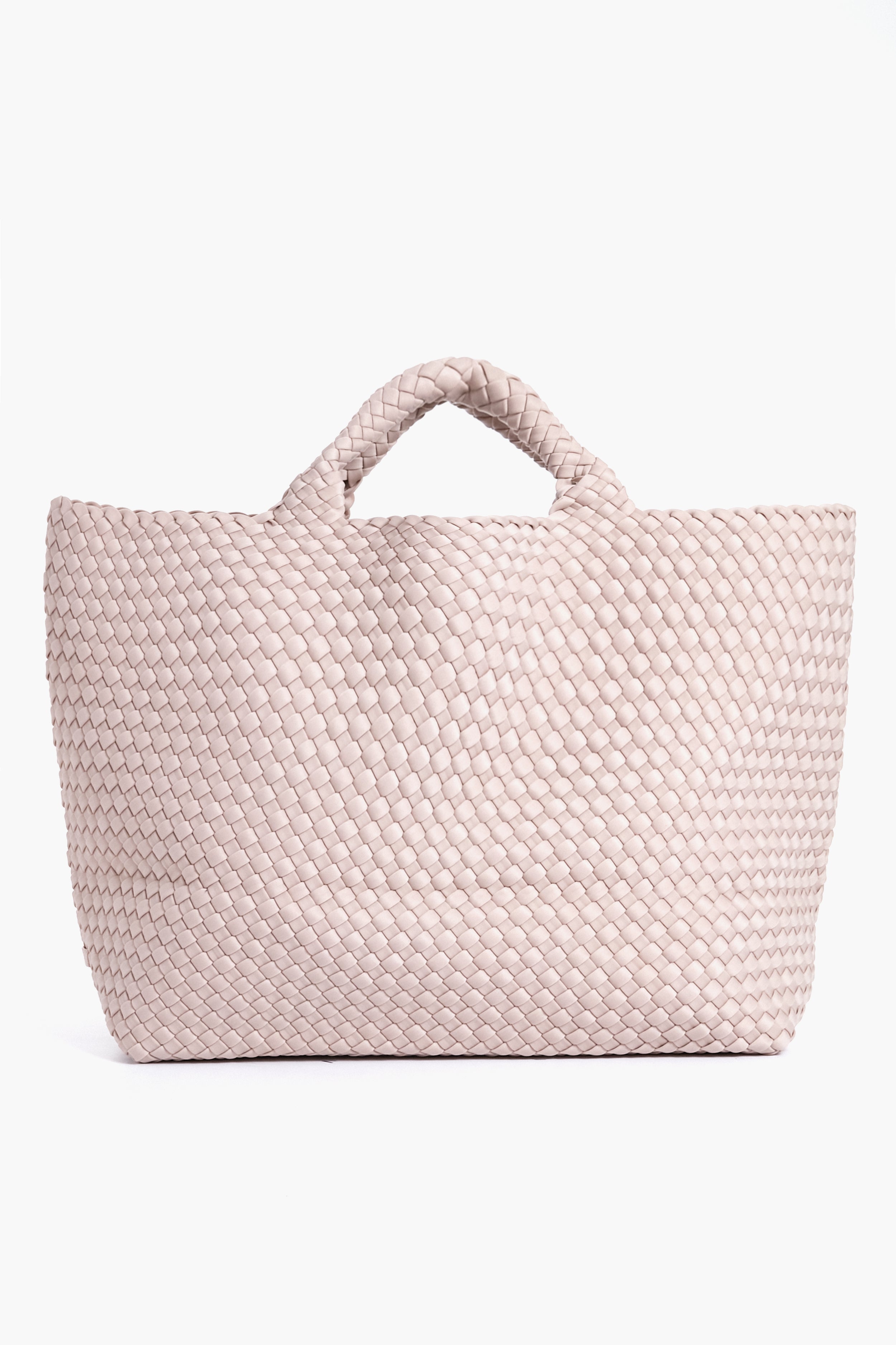 The Naghedi St Barths Large Tote is a spacious, light beige bag featuring two short handles and a woven design.