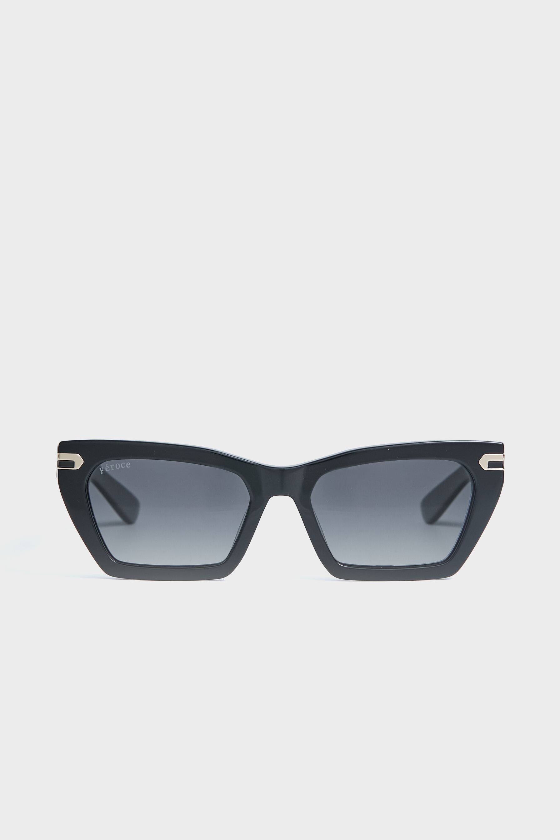 Feroce Black Heather Mini Sunglasses showcase a sleek rectangular Italian acetate frame, dark polarized lenses, and refined metallic accents on the upper corners.