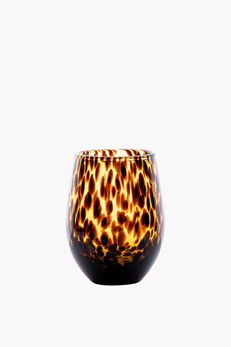 The Juliska stemless wine glass features a rounded tortoiseshell design in brown and amber tones. Perfect for any occasion, this stylish tumbler is also dishwasher safe for easy cleaning.