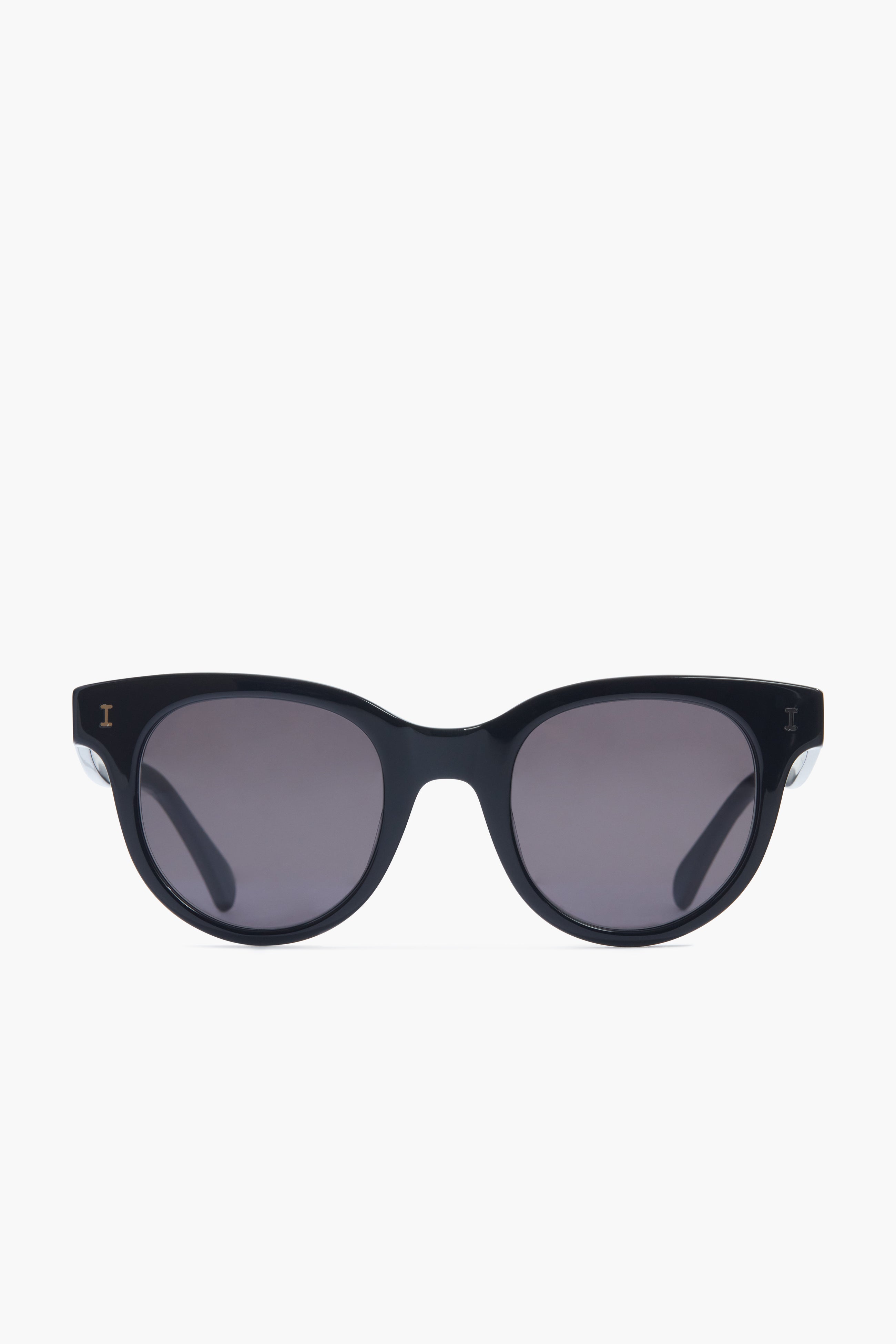Illesteva Black Silica Sunglasses feature round frames and dark tinted UV400 lenses, providing timeless style and superior eye protection.
