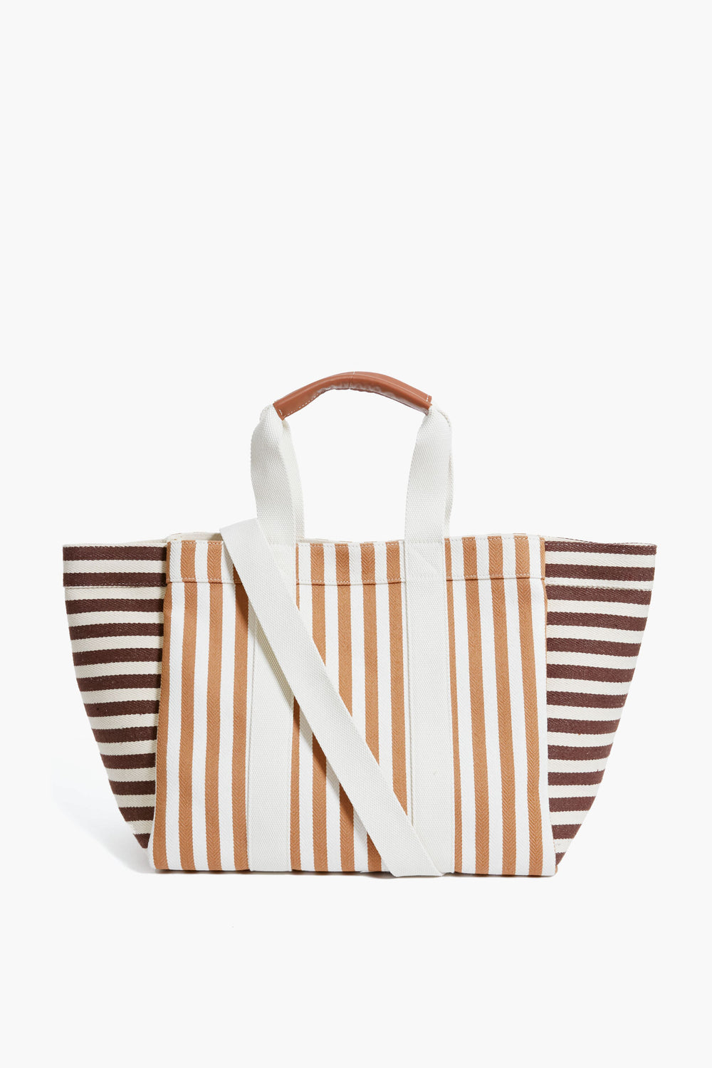 The Rue de Verneuil luxury tote bag features brown, beige, and white stripes, leather top handles with a brown grip, and a detachable shoulder strap.
