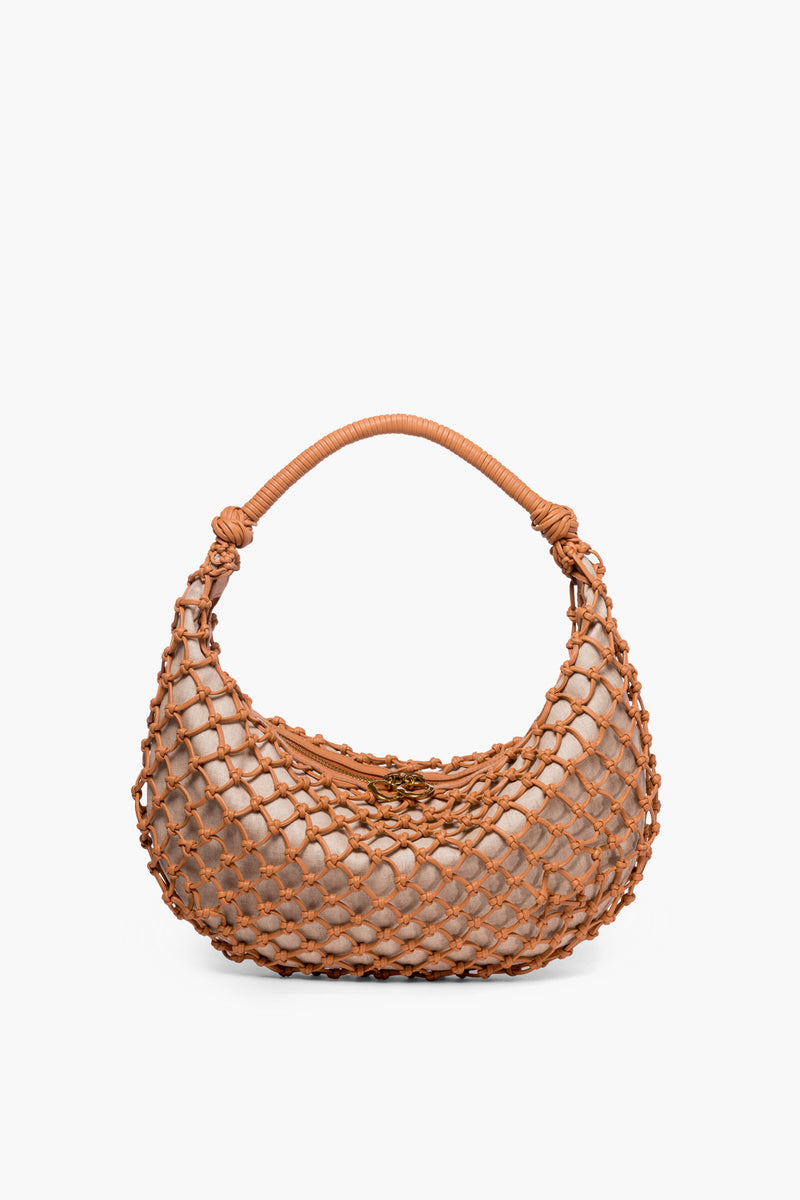 A small STAUD shoulder bag in beige, featuring a rounded shape with a brown woven net overlay and a matching brown handle.