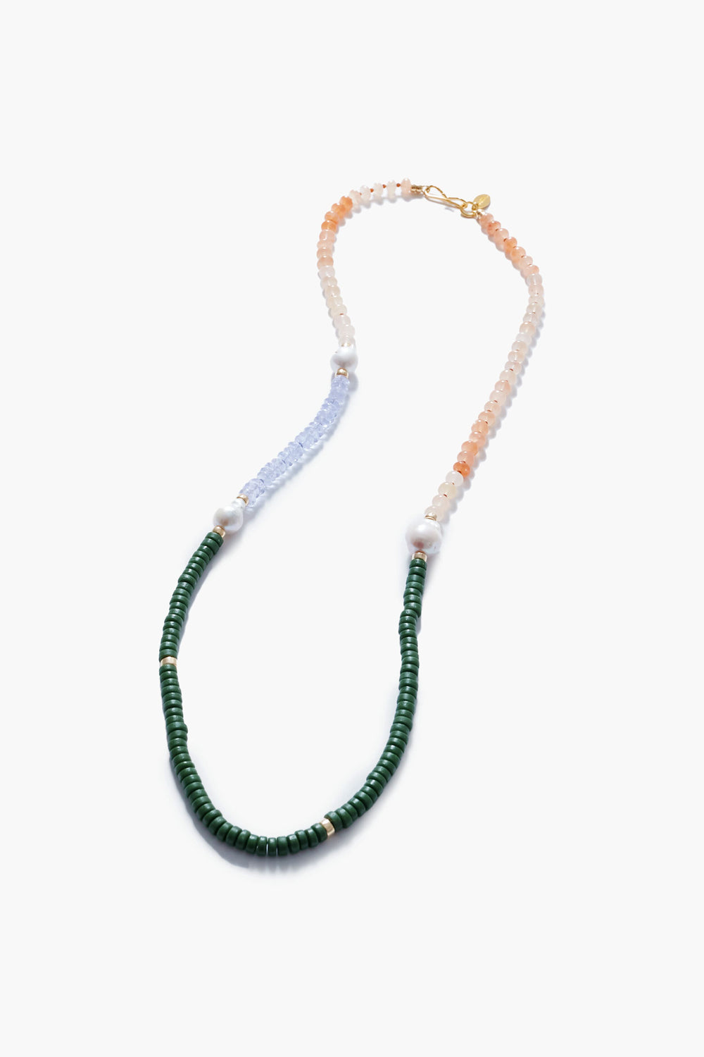 Lizzie Fortunato’s handcrafted multi-beaded necklace features green, peach, and light blue beads, accented with white pearls and a gold clasp—a fresh take on the classic freshwater pearl necklace.