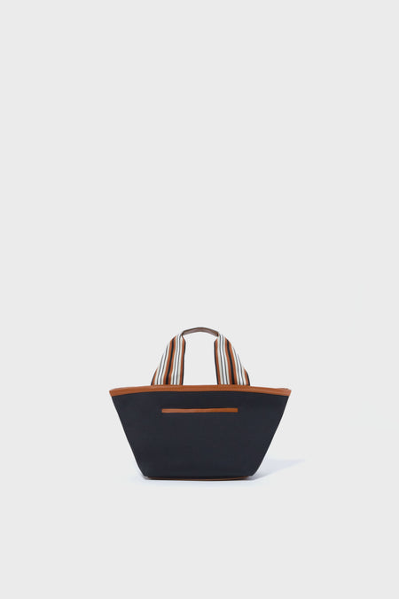 The Tuckernuck Accessories black tote bag features brown trim and striped handles, making it perfect for everyday use.