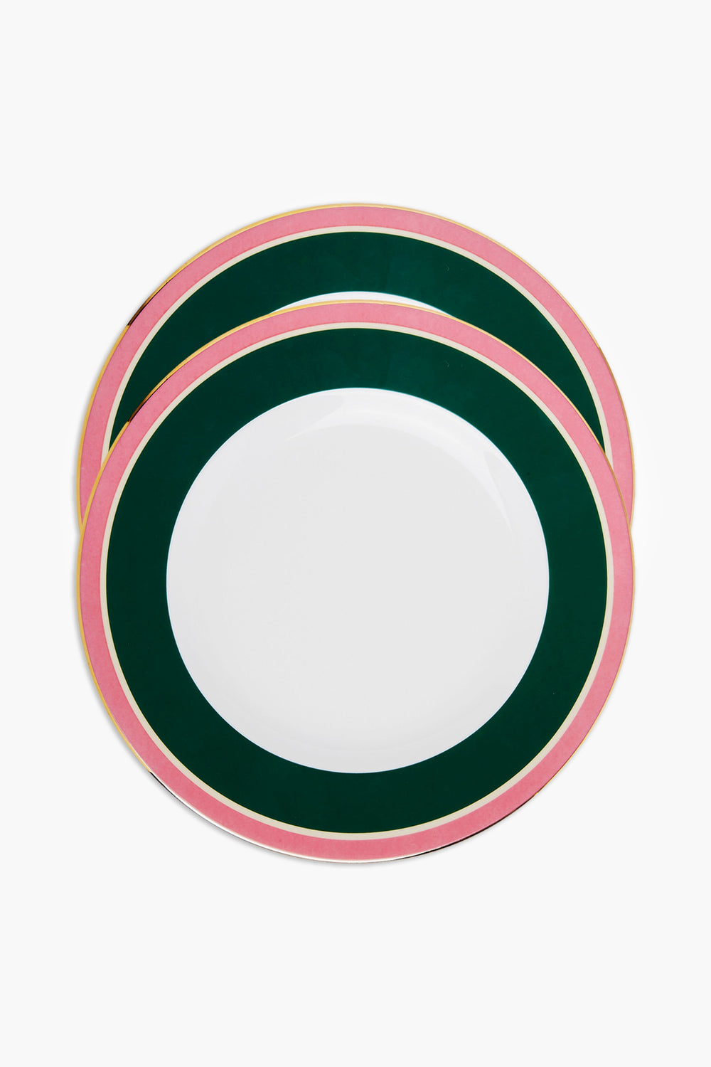 Two round La DoubleJ Italian porcelain dinner plates with a white center, dark green inner rim, and pink outer rim are stacked slightly offset. Elegant hand-painted 18k gold trim adds luxury to this colorful tableware.