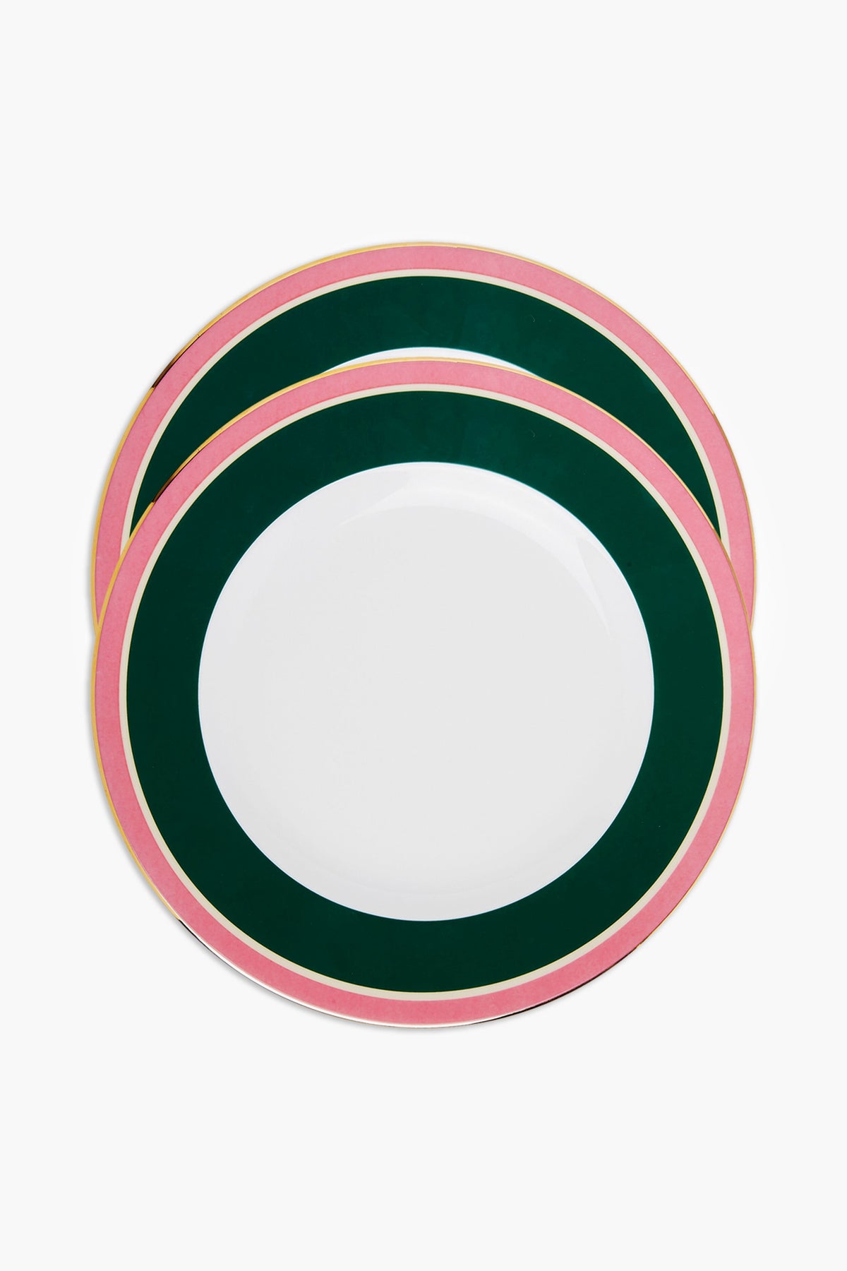Two round La DoubleJ Italian porcelain dinner plates with a white center, dark green inner rim, and pink outer rim are stacked slightly offset. Elegant hand-painted 18k gold trim adds luxury to this colorful tableware.