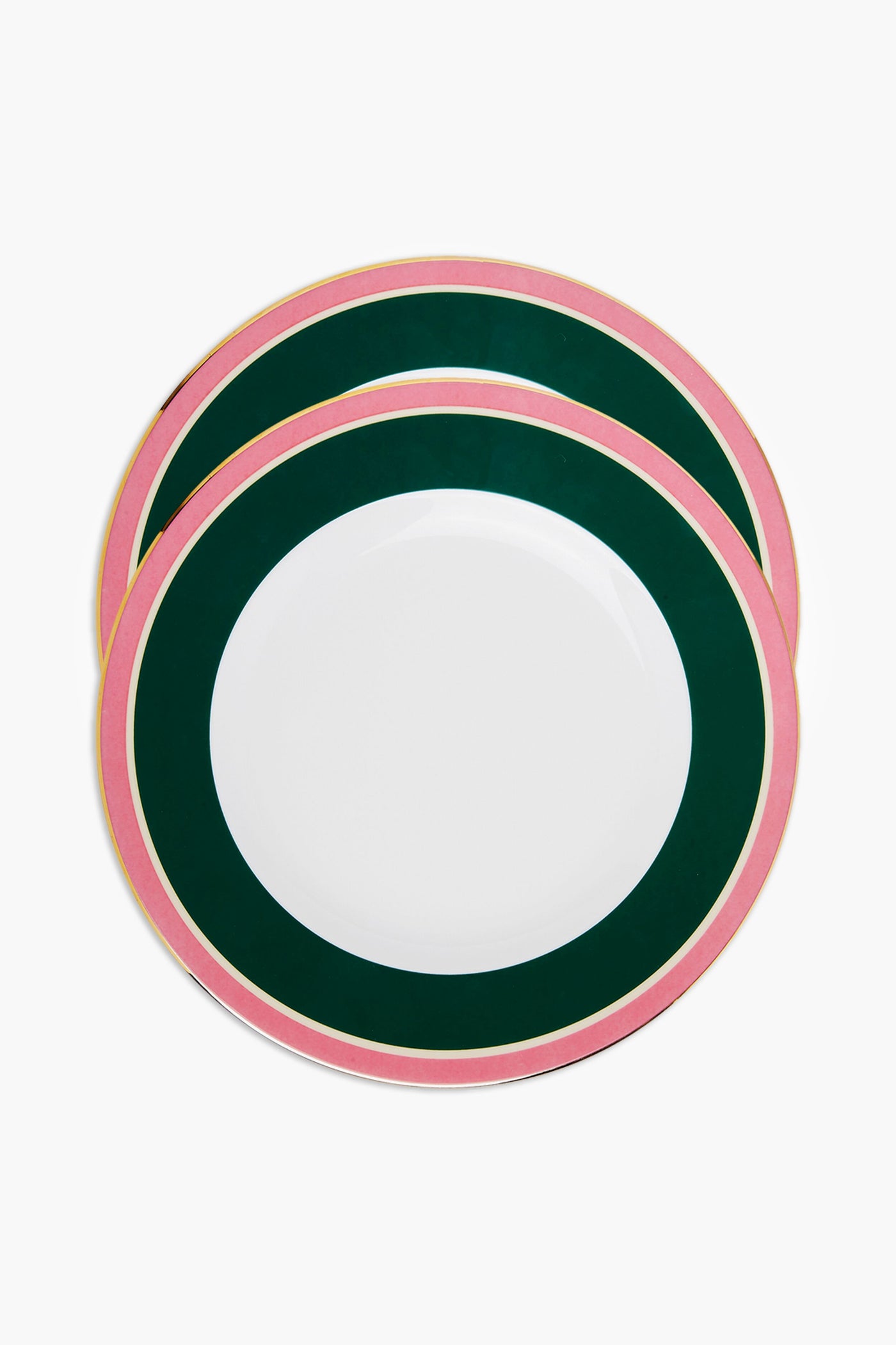 Two round La DoubleJ Italian porcelain dinner plates with a white center, dark green inner rim, and pink outer rim are stacked slightly offset. Elegant hand-painted 18k gold trim adds luxury to this colorful tableware.