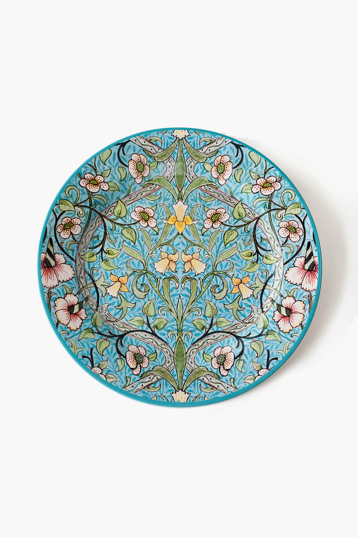 One Hundred 80 Degrees round ceramic plate with a detailed, symmetrical floral pattern in blue, green, pink, yellow, and black.