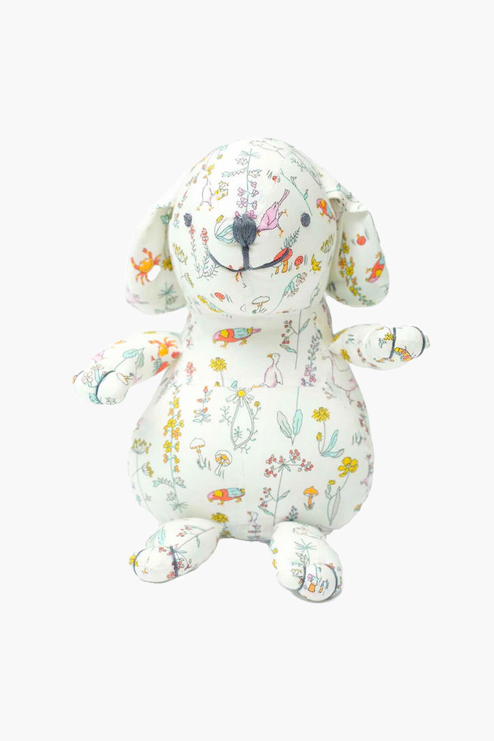 The Louelle. stuffed linen bunny features floppy ears and soft white fabric adorned with colorful floral and animal illustrations—a charming pick for nursery decor or a luxury baby gift.