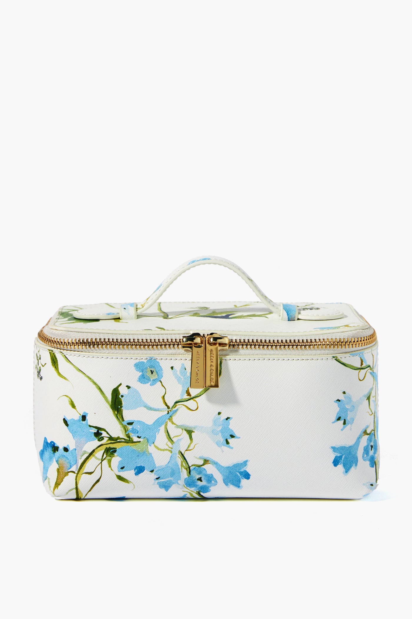 The Neely & Chloe x Inslee small rectangular white vanity case features blue floral prints, a top handle, and a gold zipper with dual pulls—perfect for gifting this holiday season.