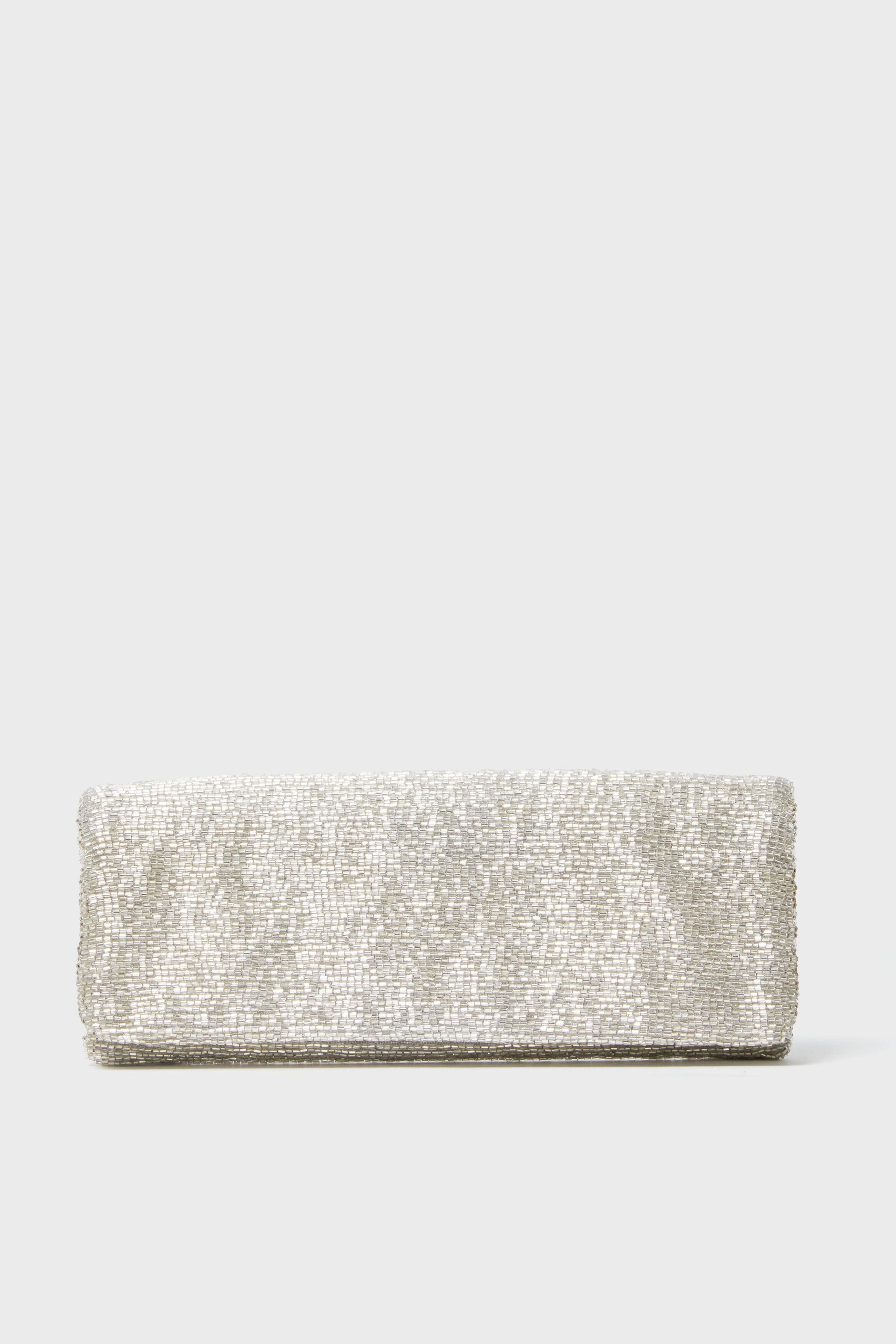 The Tiana Designs rectangular silver beaded clutch purse is an elegant evening bag.